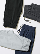 Load image into Gallery viewer, Uniqlo Ultra Stretch Active Jogger Pants