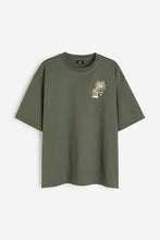 Load image into Gallery viewer, H&amp;M Oversized Fit Printed T-shirt Khaki green/Hardcore
