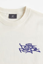 Load image into Gallery viewer, H&amp;M Loose Fit Printed T-shirt Beige/Deez Peepz
