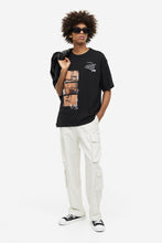 Load image into Gallery viewer, H&amp;M Relaxed Fit Printed T-shirt Black/Happens in LA
