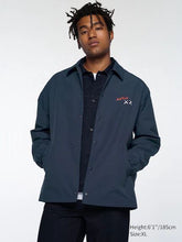 Load image into Gallery viewer, Uniqlo KAWS + Warhol UT Coach Jacket
